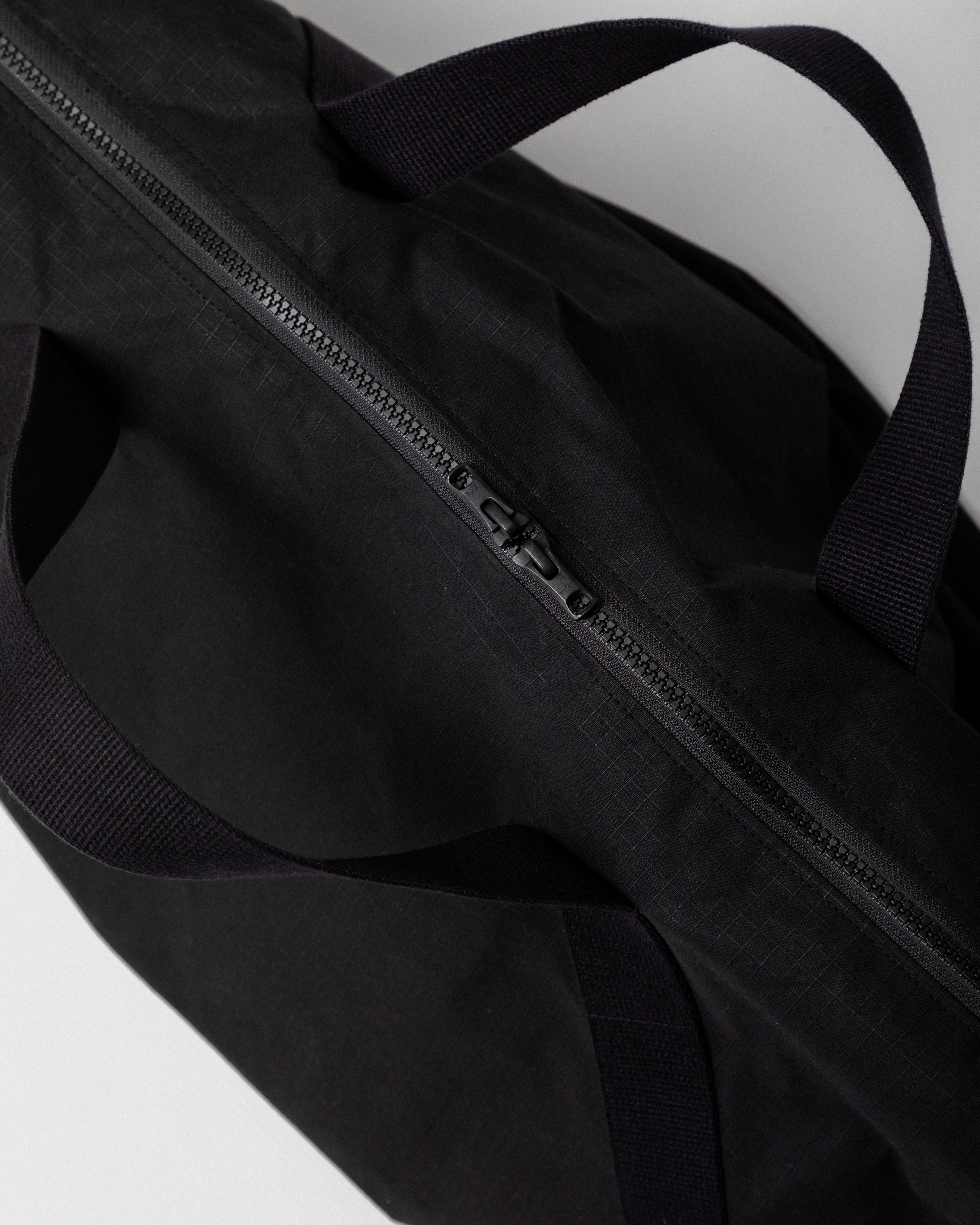 Water Resistant Duffle Bag - Black – WAWWA Ф