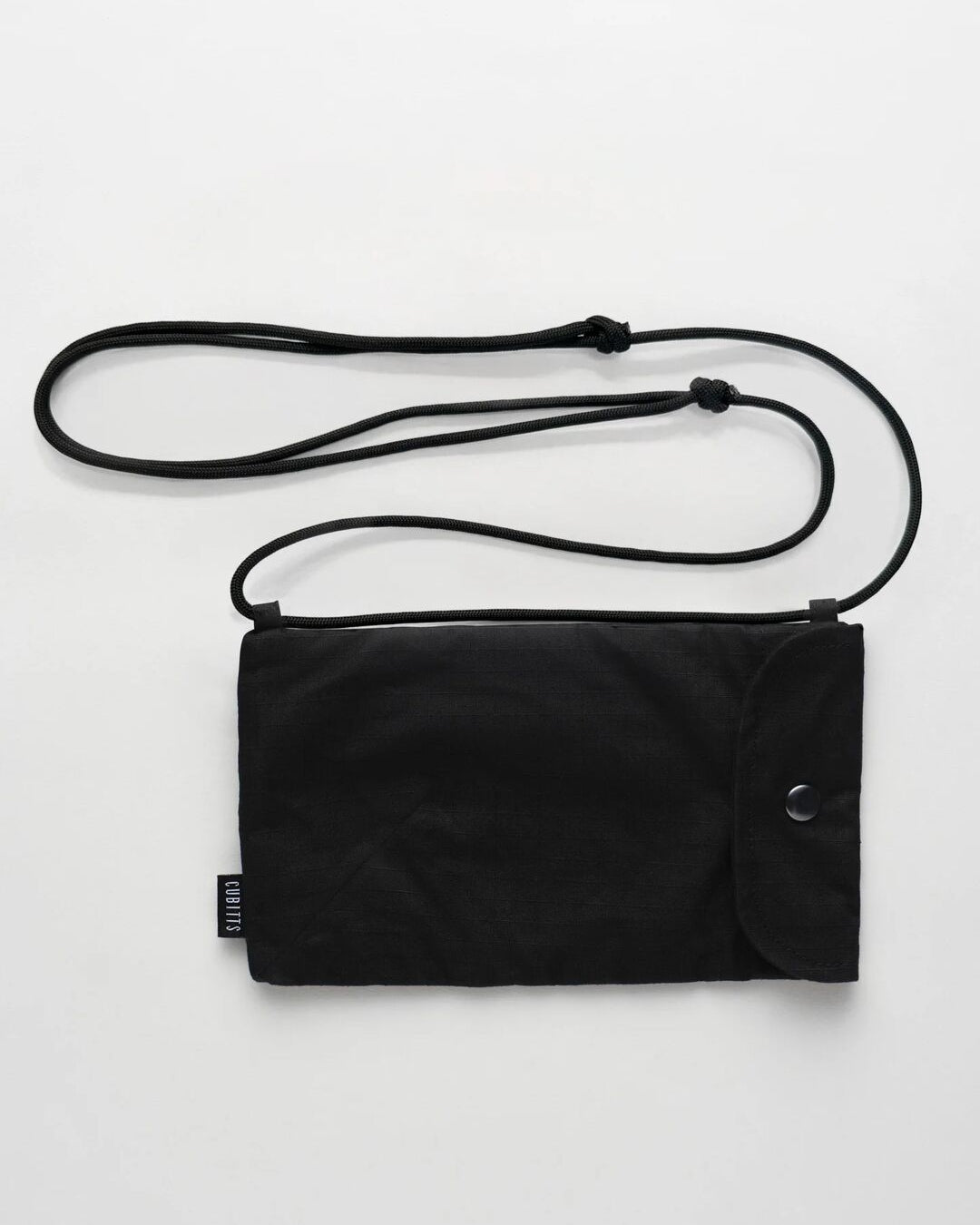 Cubitts x WAWWA Sunnies Sling in black ripstop with adjustable paracord strap and popper closure