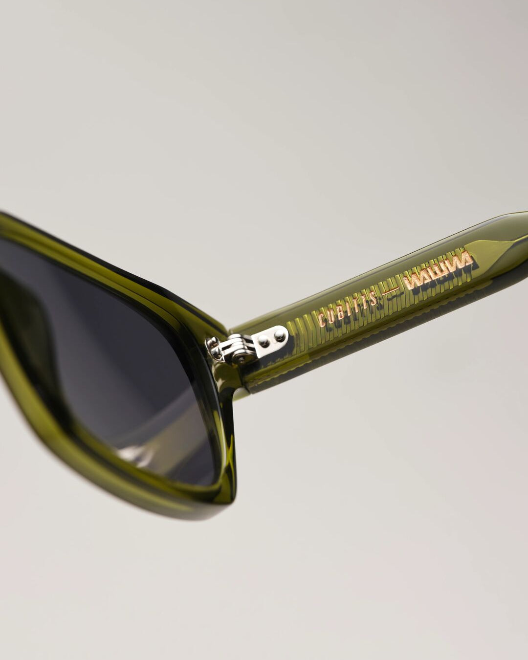 Cubitts and WAWWA engraving detail on Solaris Sunglasses khaki temple arm